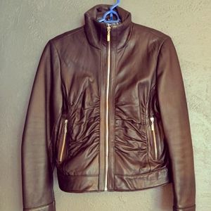 Un Deux Trois black leather jacket